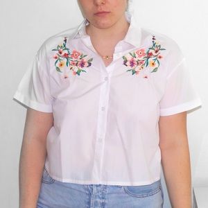 Women’s white blouse with floral embroidery